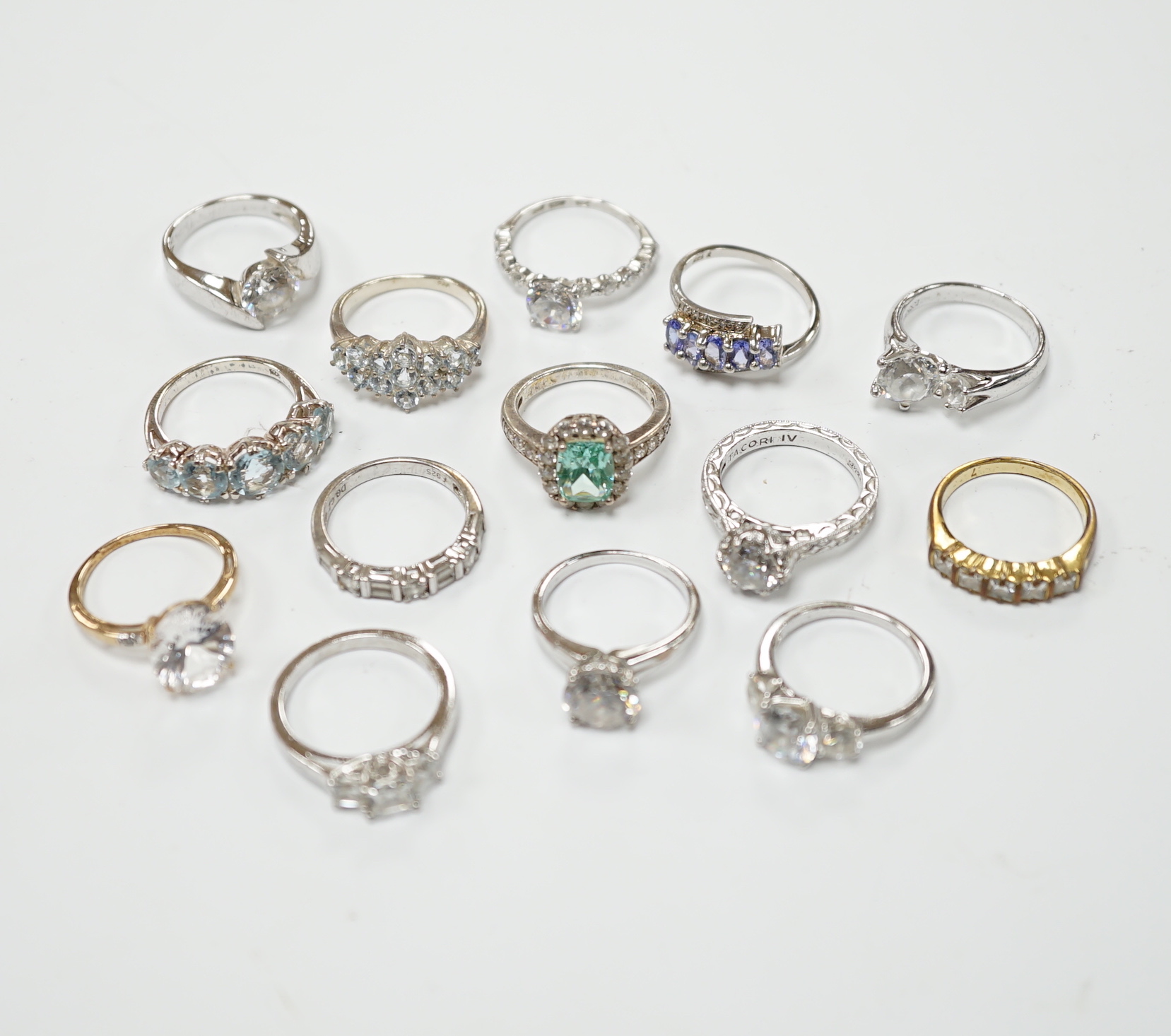 A collection of assorted paste set dress rings and sundry costume jewellery